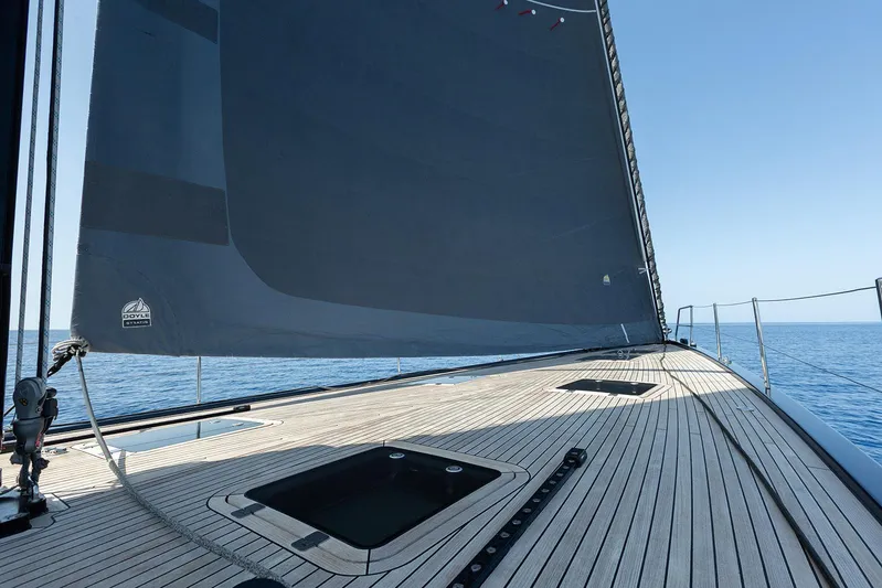 Caiarossa Yacht Photos Pics Sailing yacht Shipman 72 (2009) with sleek deck and large sail on open sea.