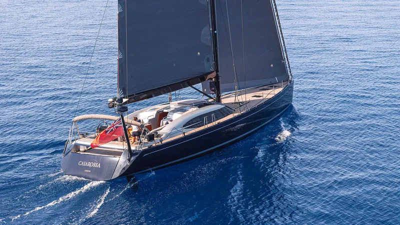 Caiarossa Yacht Photos Pics Sailing yacht Shipman 72, 2009 model, cruising on open blue sea.