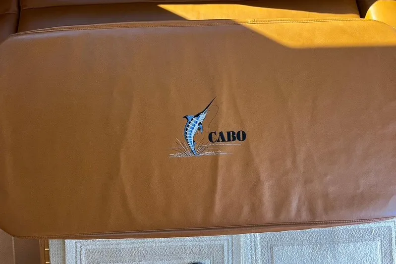 Assalt Weapon Yacht Photos Pics Brown leather seat with Cabo logo and marlin embroidery, 2007 Cabo 35 Flybridge.