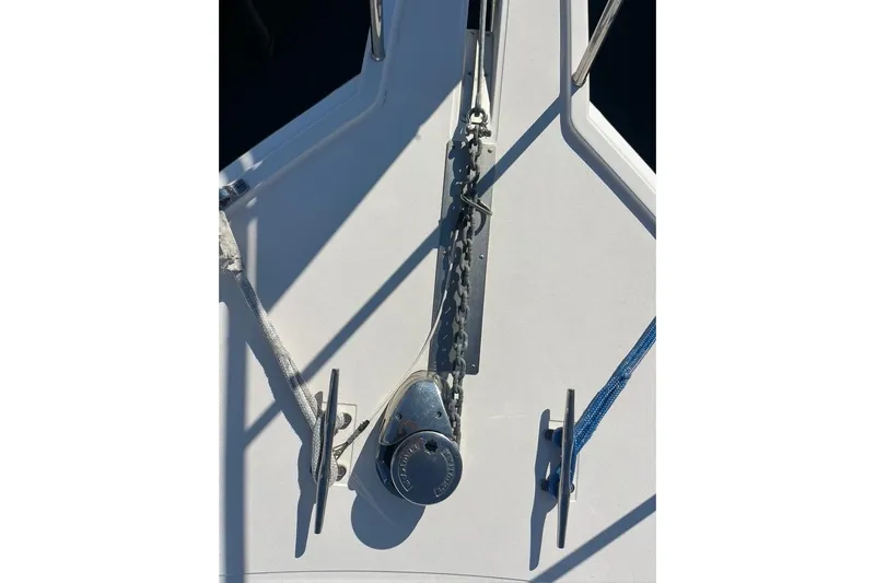 Assalt Weapon Yacht Photos Pics Bow of 2007 Cabo 35 Flybridge with anchor chain and cleats.