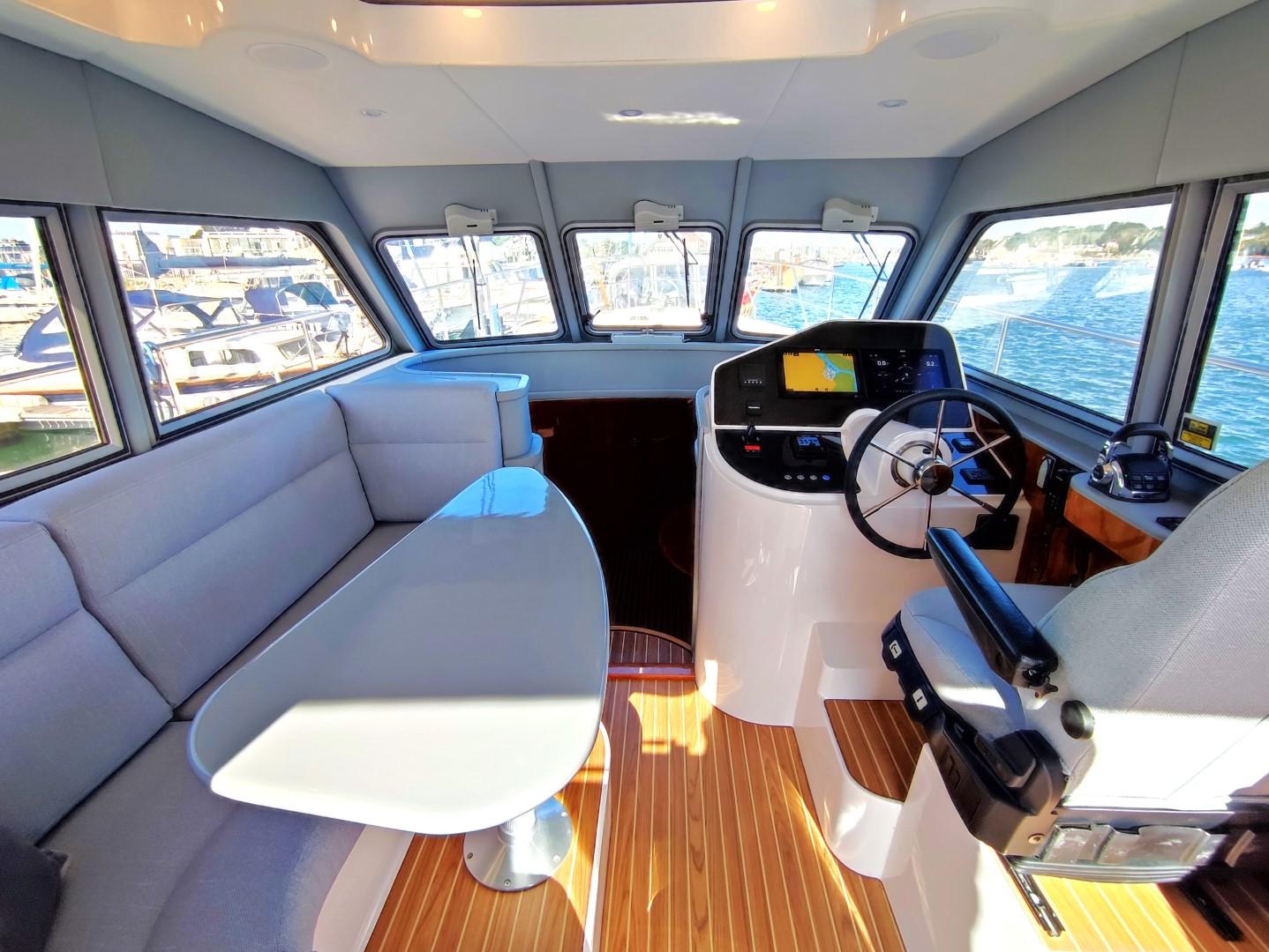 Interior of 2017 Elling E4 Ultimate yacht with modern helm and seating area.