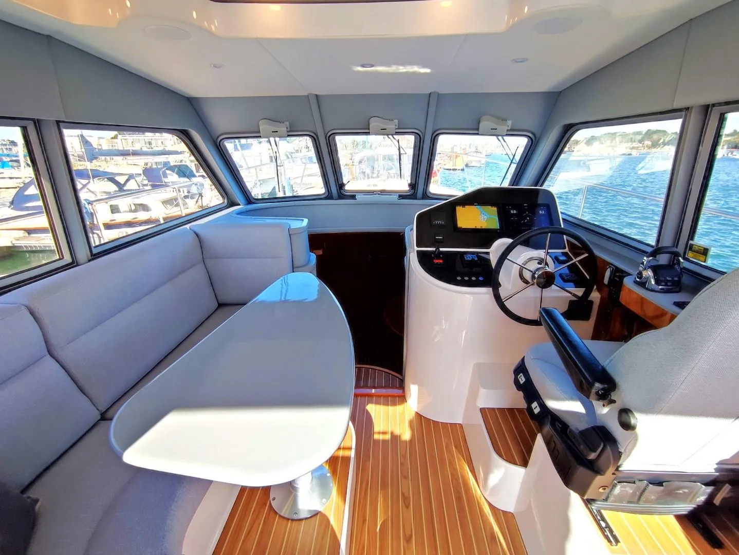 Interior of 2017 Elling E4 Ultimate yacht with modern helm and seating area.