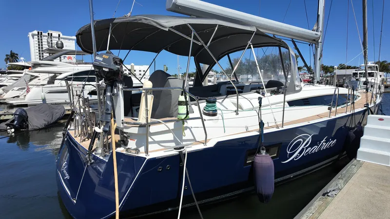  Yacht Photos Pics 2021 Jeanneau 51 yacht docked at marina, featuring sleek design and modern amenities.