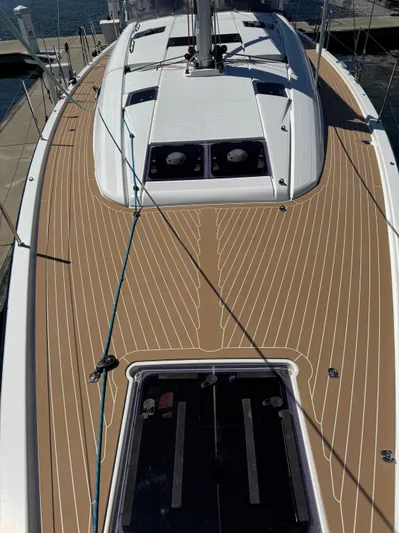  Yacht Photos Pics 2021 Jeanneau 51 sailboat deck with sleek design and modern features.