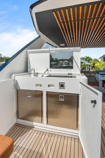 My Way Yacht Photos Pics 2023 Astondoa AS5 yacht outdoor kitchen with sleek design and stainless steel appliances.