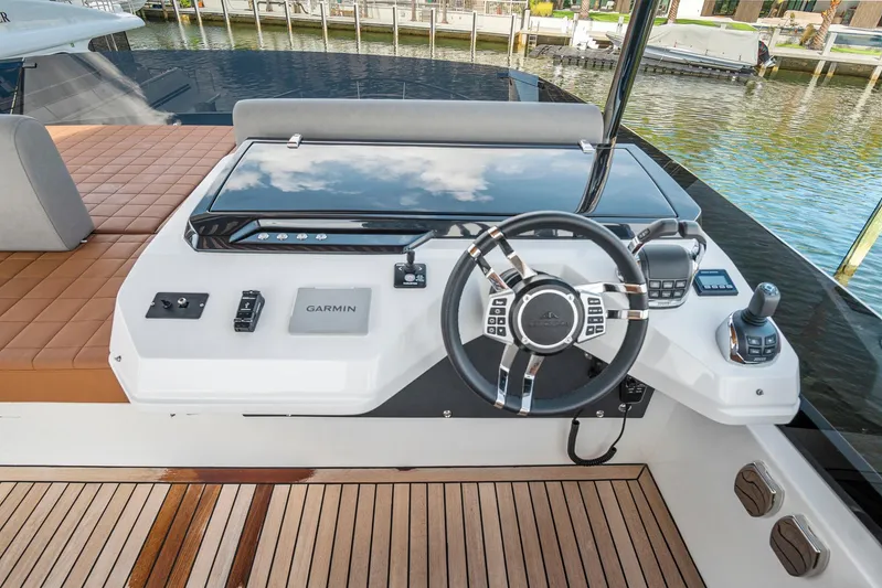 My Way Yacht Photos Pics 2023 Astondoa AS5 yacht helm with modern controls and wooden deck.