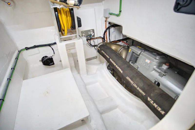 My Way Yacht Photos Pics Engine compartment of 2023 Astondoa AS5 yacht, showcasing mechanical components and wiring.