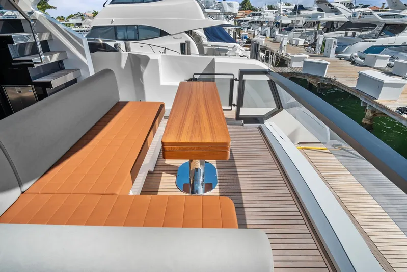My Way Yacht Photos Pics Luxury seating area on 2023 Astondoa AS5 yacht deck, featuring sleek design and waterfront view.
