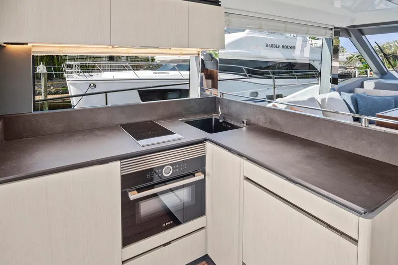 My Way Yacht Photos Pics Modern kitchen in 2023 Astondoa AS5 yacht with sleek countertops and appliances.