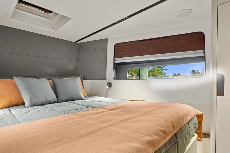 My Way Yacht Photos Pics Luxurious bedroom interior of 2023 Astondoa AS5 yacht with modern design and large window view.