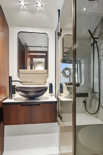 My Way Yacht Photos Pics Luxurious bathroom in 2023 Astondoa AS5 yacht with modern fixtures and elegant design.