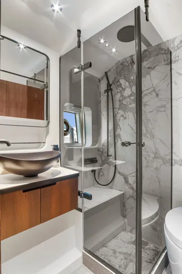 My Way Yacht Photos Pics Luxurious bathroom in 2023 Astondoa AS5 yacht with modern fixtures and marble shower.