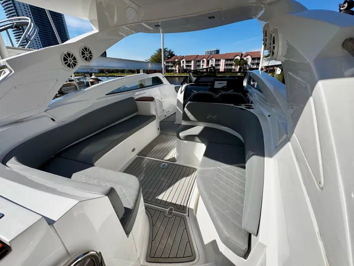  Yacht Photos Pics 2024 NX Boats 280 Xtreme interior with sleek seating and modern design.