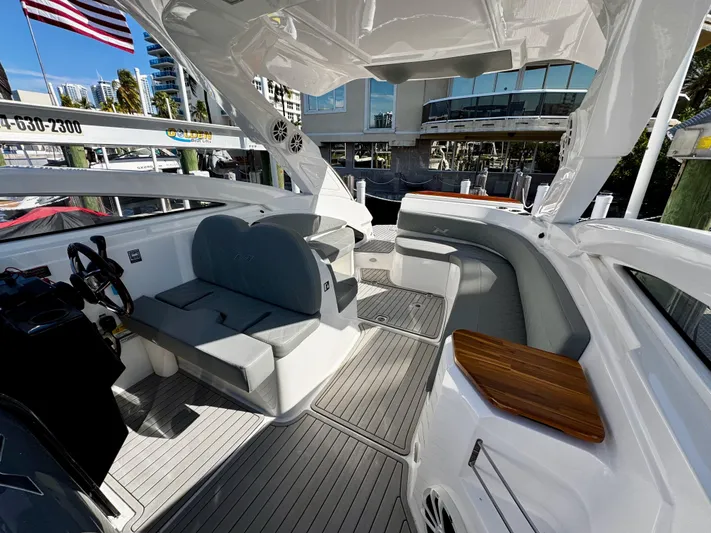  Yacht Photos Pics 2024 NX Boats 280 Xtreme interior with seating and modern design.