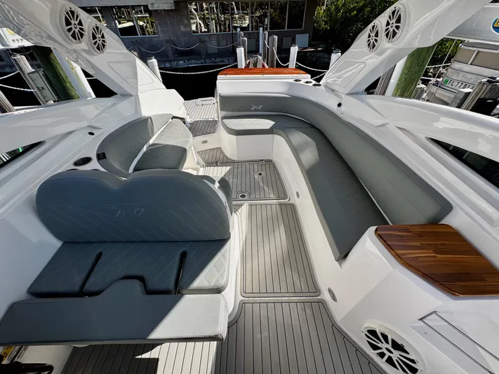  Yacht Photos Pics 2024 NX Boats 280 Xtreme interior with sleek seating and modern design.