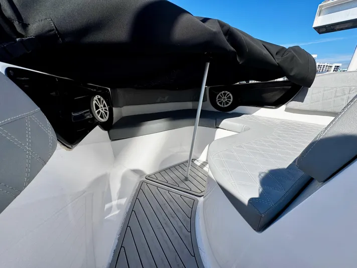  Yacht Photos Pics 2024 NX Boats 280 Xtreme interior with sleek seating and modern design.