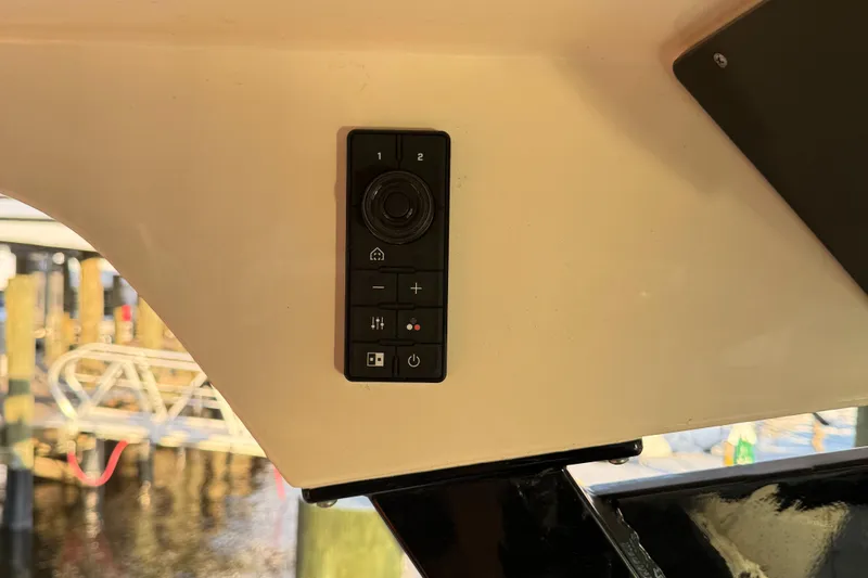  Yacht Photos Pics Control panel on a 2021 Scout 330 LXF boat, featuring various buttons and a joystick.