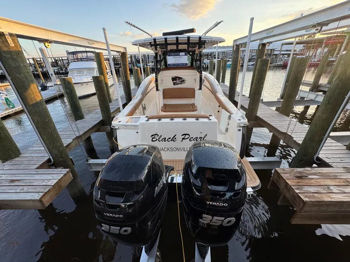  Yacht Photos Pics 2021 Scout 330 LXF boat docked with twin Verado 350 engines.