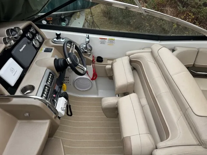  Yacht Photos Pics 2013 Formula 350 Sun Sport boat interior with beige seating and modern dashboard.
