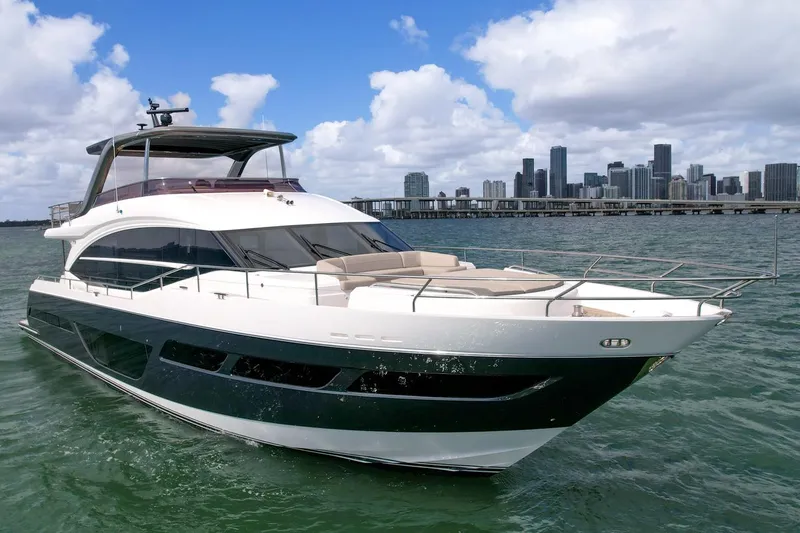  Yacht Photos Pics Princess Y78 yacht cruising near city skyline, 2021 model.