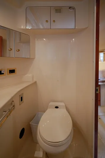  Yacht Photos Pics Bathroom interior of 2000 Sea Ray 510 Sundancer yacht, featuring modern fixtures and cabinetry.