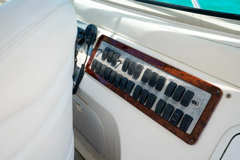  Yacht Photos Pics Control panel of a 2000 Sea Ray 510 Sundancer yacht, featuring multiple switches.