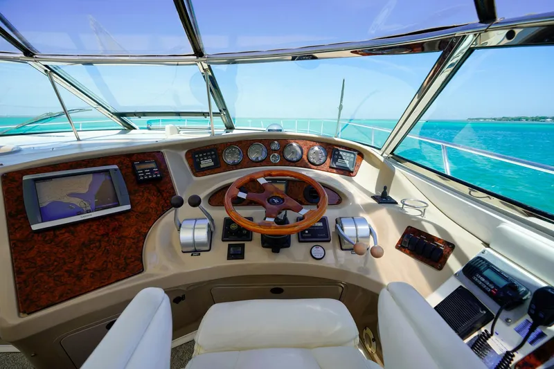  Yacht Photos Pics Helm of 2000 Sea Ray 510 Sundancer yacht with ocean view and navigation instruments.