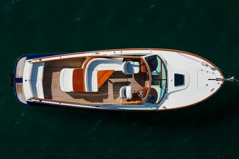 Pappy Yacht Photos Pics 2004 Hinckley Talaria 29 Runabout, aerial view, elegant design, wooden deck, luxury boat.