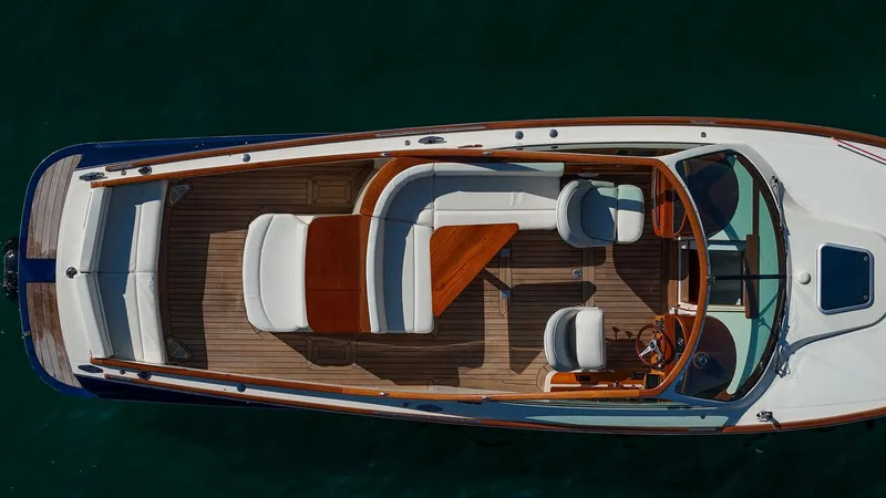 Pappy Yacht Photos Pics 2004 Hinckley Talaria 29 Runabout, aerial view, showcasing elegant deck and seating arrangement.