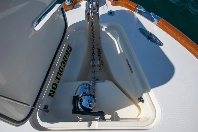 Pappy Yacht Photos Pics Anchor compartment of 2004 Hinckley Talaria 29 Runabout with visible chain and winch.