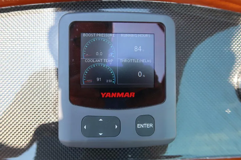 Pappy Yacht Photos Pics Yanmar engine display on 2004 Hinckley Talaria 29 Runabout, showing boost pressure and coolant temperature.