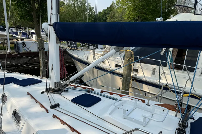 Nino Yacht Photos Pics Sailboat docked in marina, Tartan 4100 model, 2007, with blue sail cover.