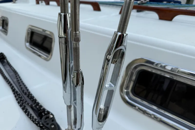 Nino Yacht Photos Pics Close-up of rigging hardware on a 2007 Tartan 4100 sailboat deck.