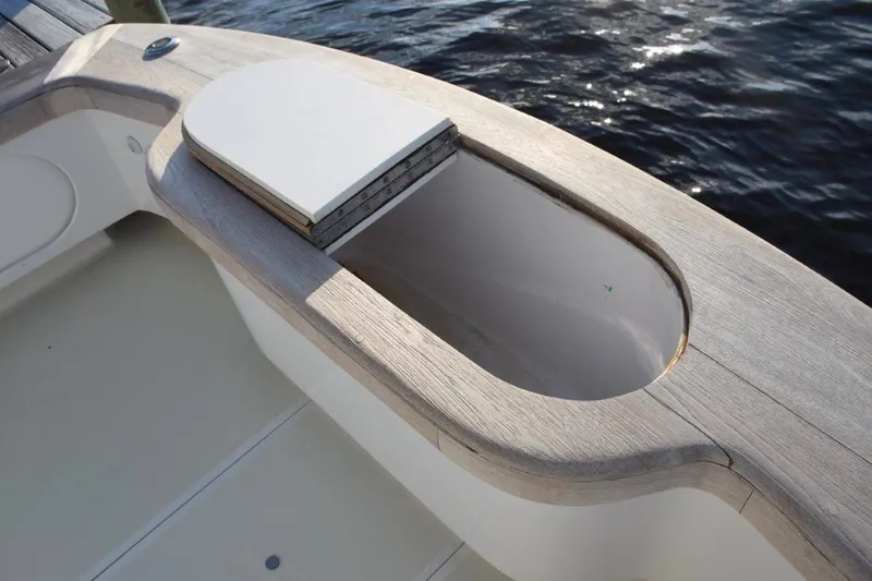 Osprey Yacht Photos Pics Transom fish box with cutting board underneath fold open lids
