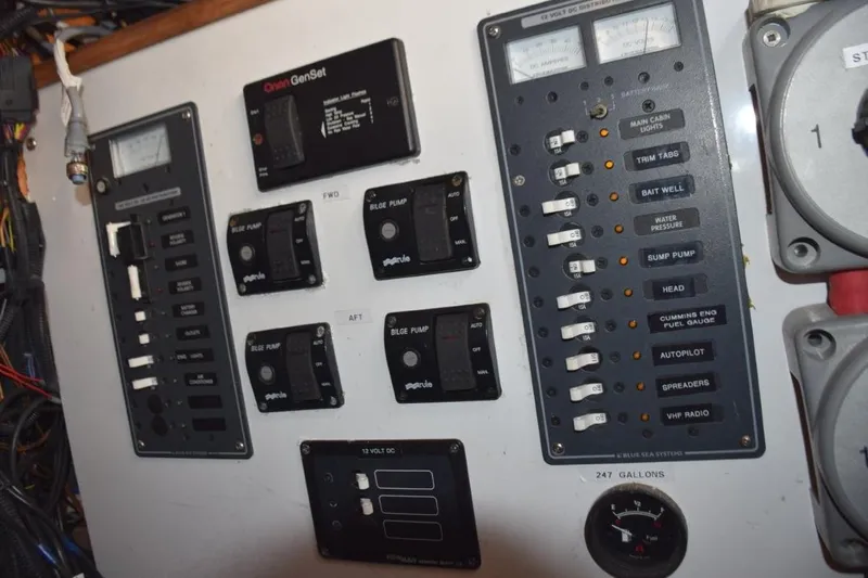Osprey Yacht Photos Pics Breaker panel, shore power/gen switching, bilge pump monitors and fuel gauge (beneath console)