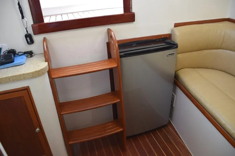 Osprey Yacht Photos Pics Teak steps down to teak and holly cabin sole