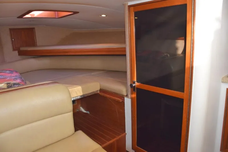 Osprey Yacht Photos Pics Portside door to head compartment. Forward quarter berth and overhead hatch