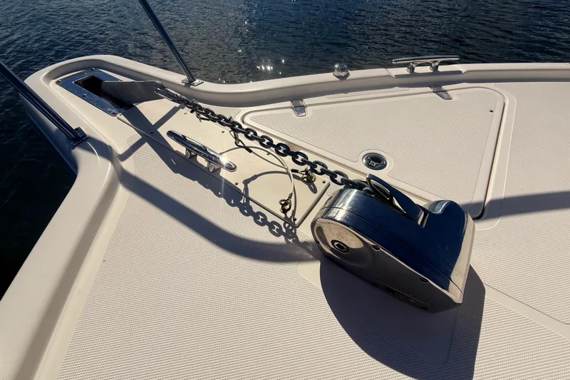  Yacht Photos Pics Bow of 2010 Pursuit OS 345 Offshore boat with anchor chain and winch.