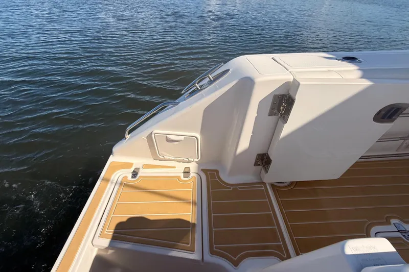  Yacht Photos Pics 2010 Pursuit OS 345 Offshore boat deck with water view.