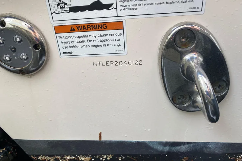  Yacht Photos Pics 2022 Grady-White Express 370 boat warning label and hardware detail.