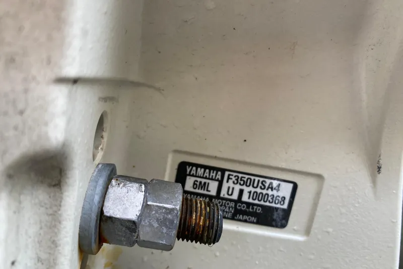  Yacht Photos Pics Close-up of a Yamaha F350USA4 engine part on a 2022 Grady-White Express 370 boat.