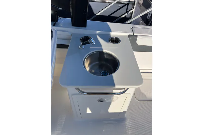  Yacht Photos Pics 2026 Robalo R257 Dual Console boat sink and faucet setup.