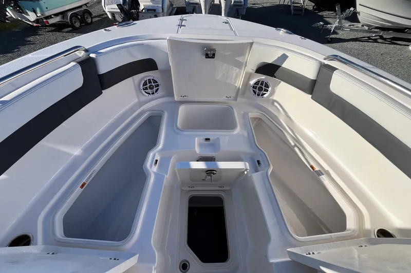  Yacht Photos Pics 2026 Robalo R257 Dual Console boat interior with open storage compartments.