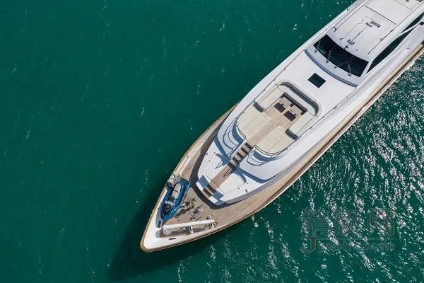 Sunshine Yacht Photos Pics Aerial view of 2010 Versilcraft Euroyacht Planet 125S Hardtop on turquoise water.