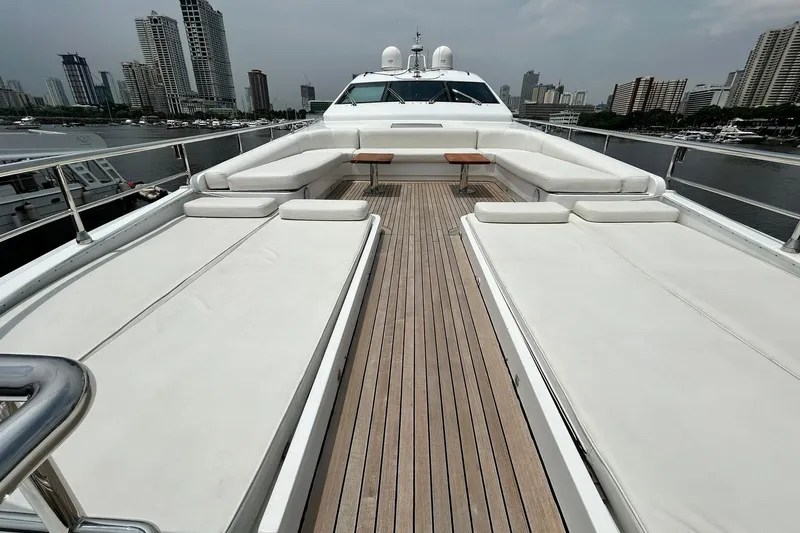 Sunshine Yacht Photos Pics Luxurious Versilcraft Euroyacht Planet 125S Hardtop 2010 with spacious deck and city skyline view.
