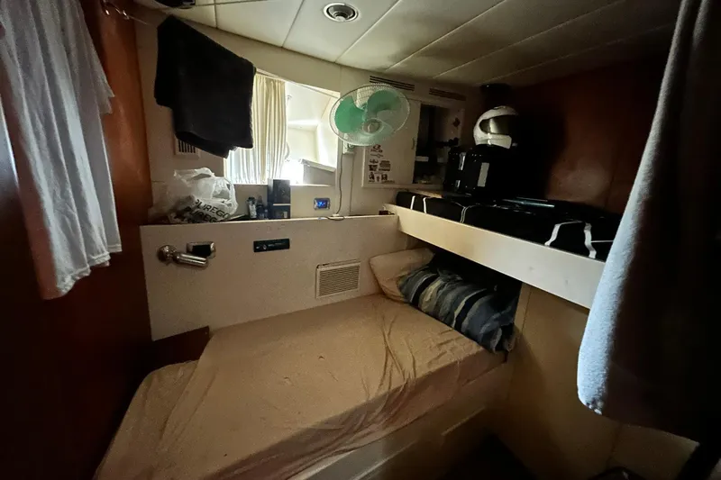 Sunshine Yacht Photos Pics Cozy cabin interior of 2010 Versilcraft Euroyacht Planet 125S Hardtop.