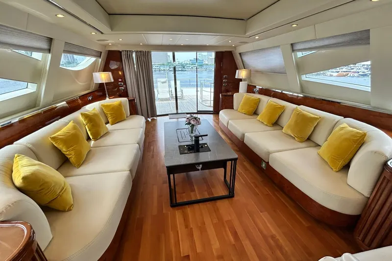Sunshine Yacht Photos Pics Luxurious Versilcraft Euroyacht Planet 125S interior with elegant sofas and yellow cushions, 2010 model.