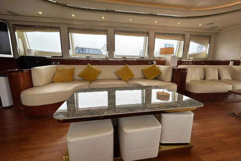 Sunshine Yacht Photos Pics Luxurious interior of 2010 Versilcraft Euroyacht Planet 125S with elegant seating and modern decor.