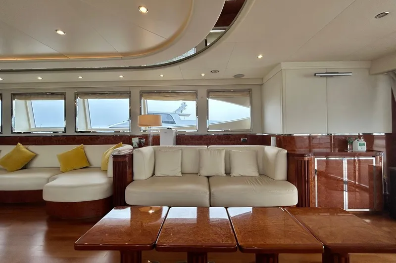 Sunshine Yacht Photos Pics Luxurious interior of 2010 Versilcraft Euroyacht Planet 125S Hardtop with elegant seating and decor.