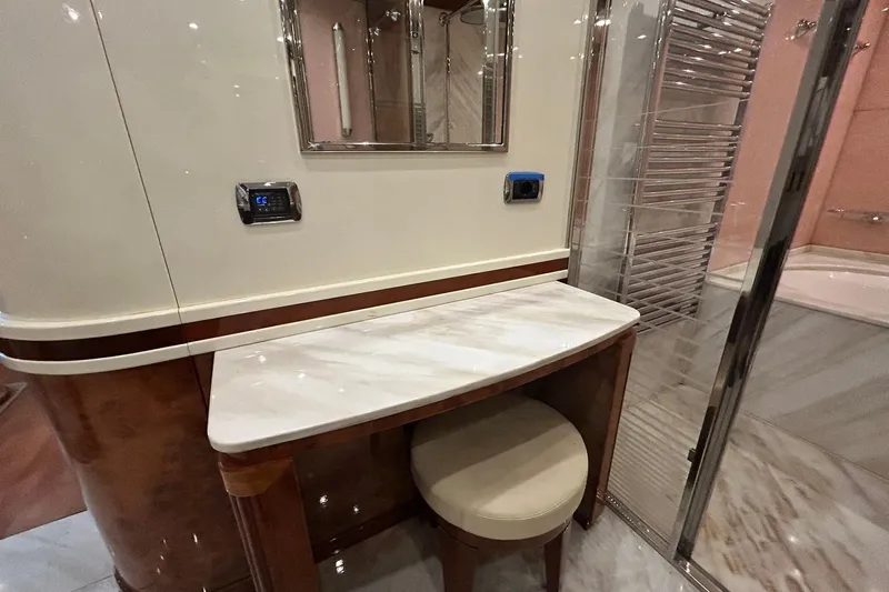 Sunshine Yacht Photos Pics Luxurious interior of 2010 Versilcraft Euroyacht Planet 125S, featuring elegant marble and wood finishes.